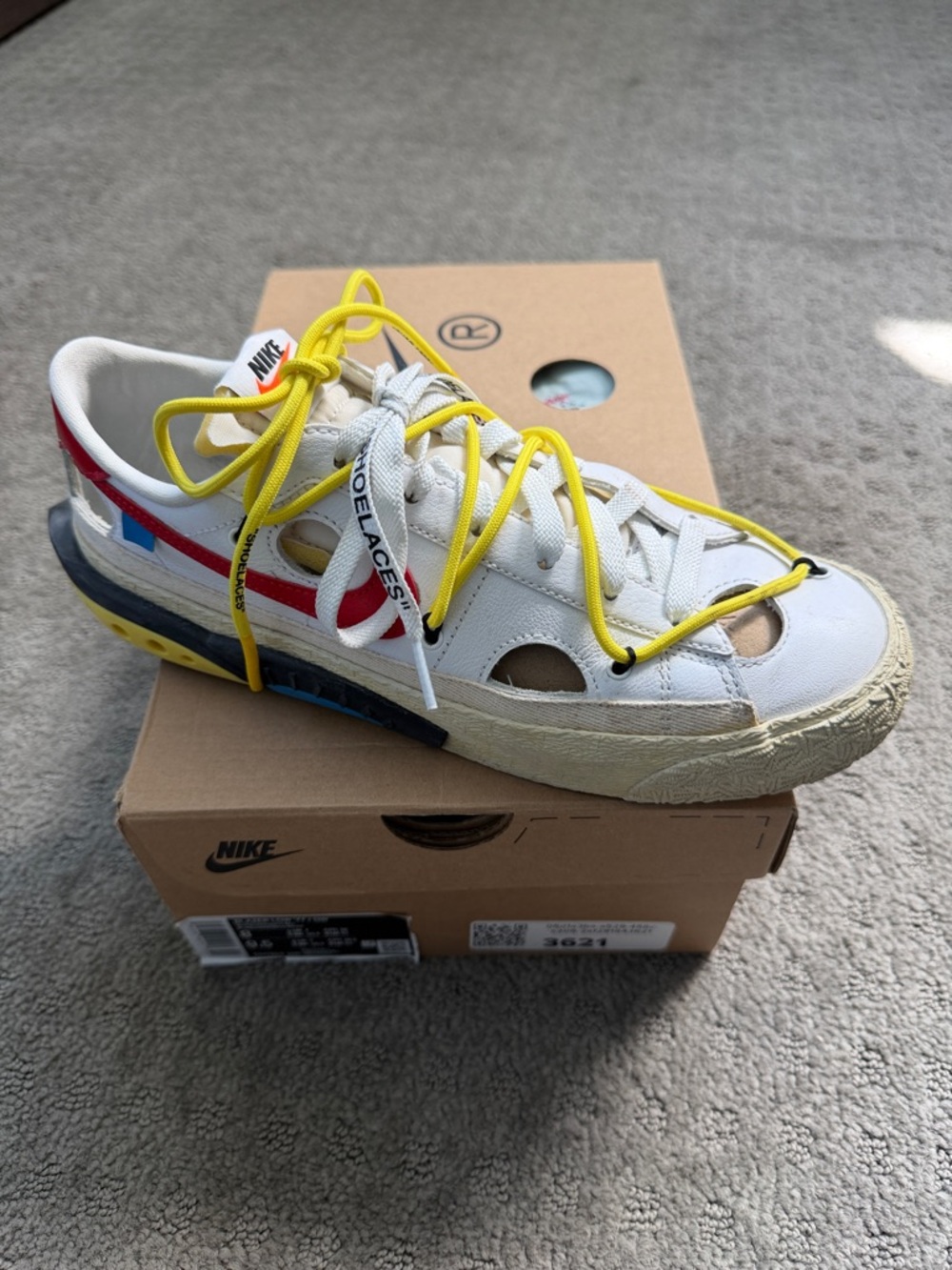 Nike Kids White Sneaker with Yellow Laces & Red/Blue Accents